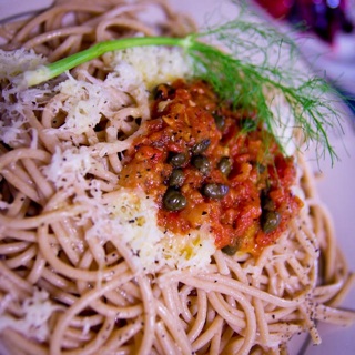 spaghetti with homemade tomato sauce with capers and olives